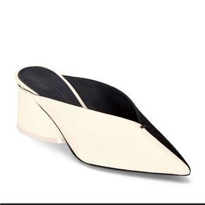 Mercedes Castillo mules, womens size 8. Modern, luxury mules perfect for summer